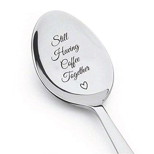 Engraved spoon with "still having coffee together"