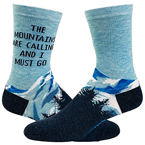 A pair of socks with mountain and the text "the mountains are calling and I must go"