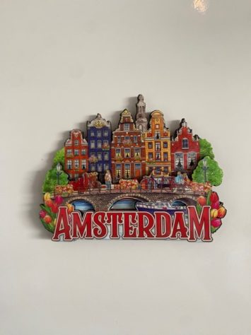 A fridge magnet with Amsterdam canal houses