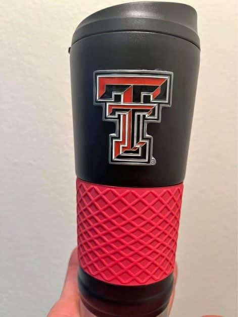 A black and red tumbler from Texas