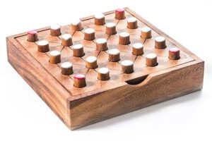A baord game with 24 wooden pieces from Nepal