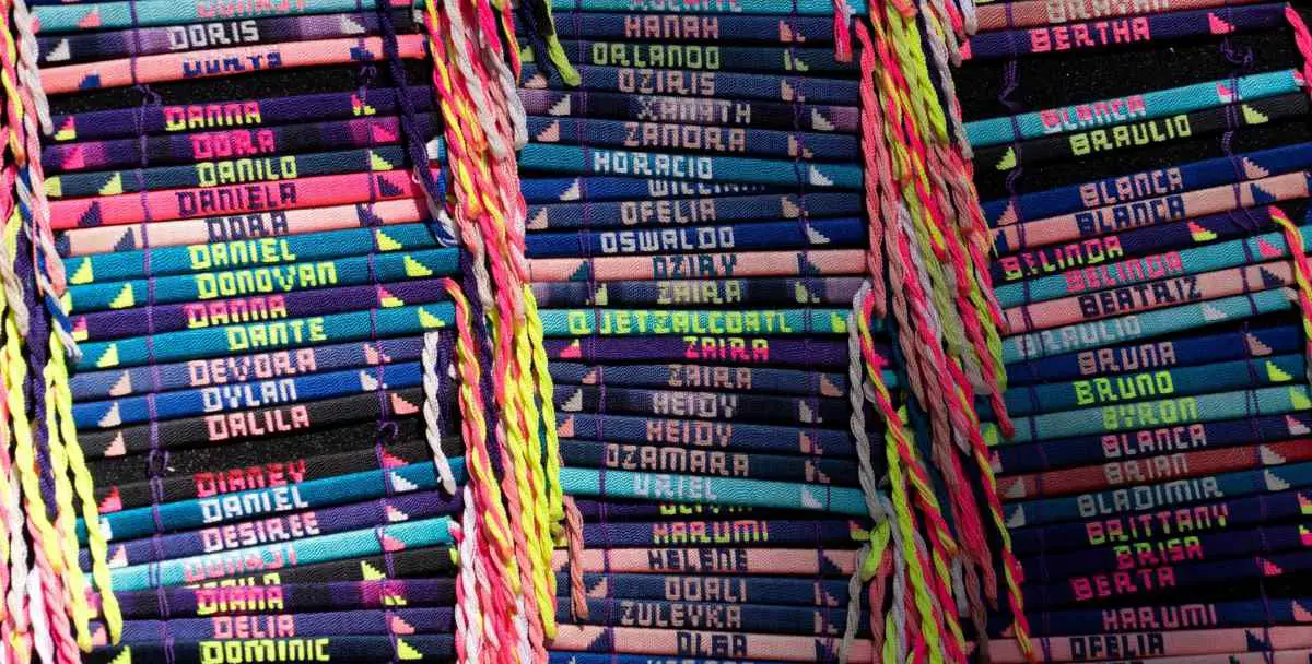 A bunch of bracelets with different names