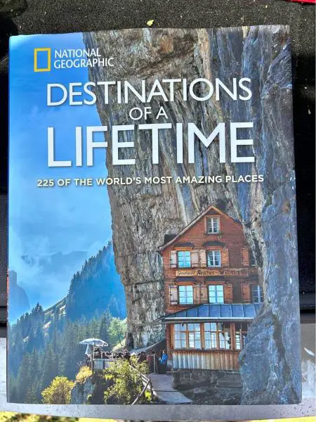A book titles "detinations of a Lifetime